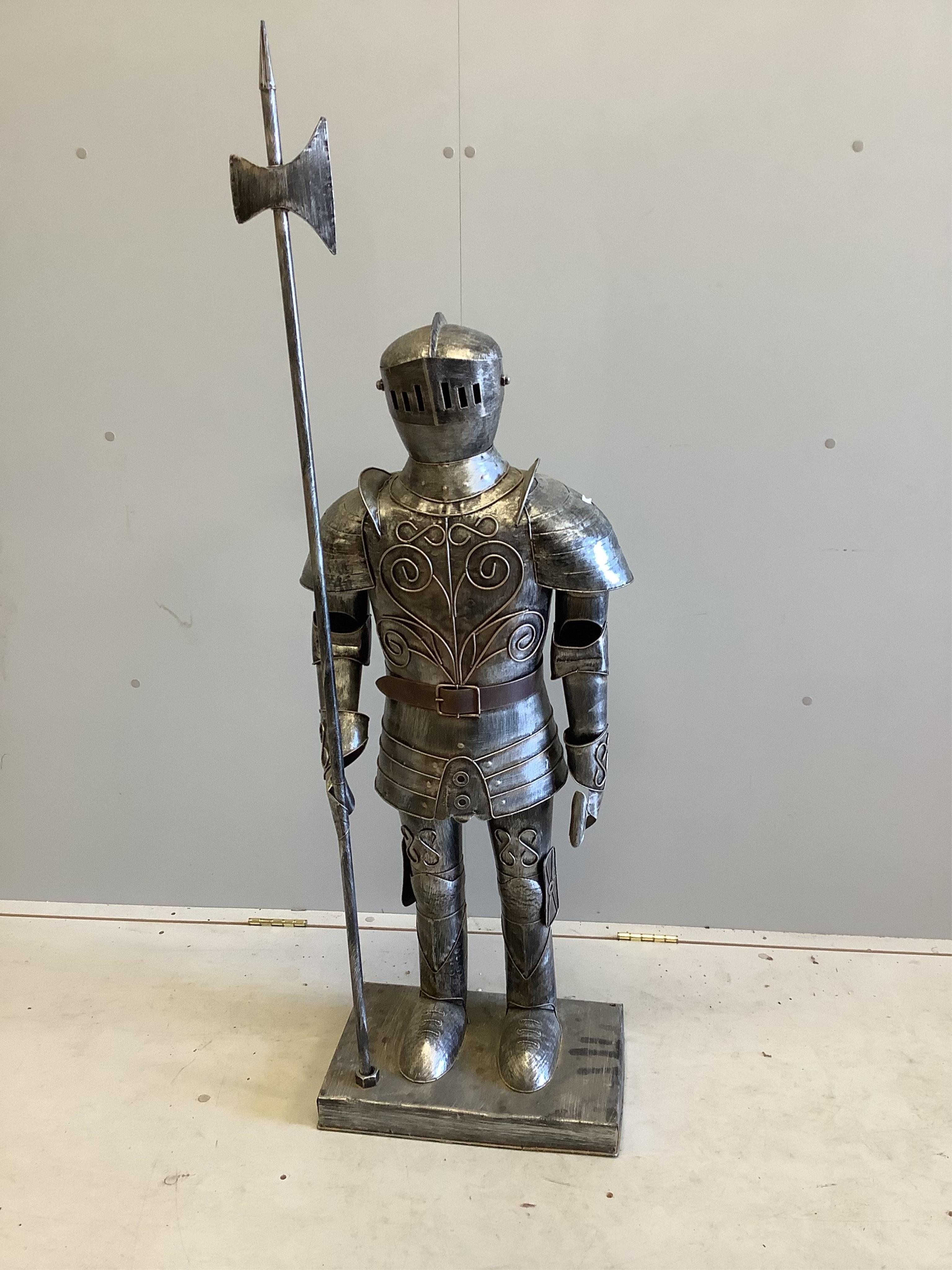 A metal miniature suit of armour, height 140cm